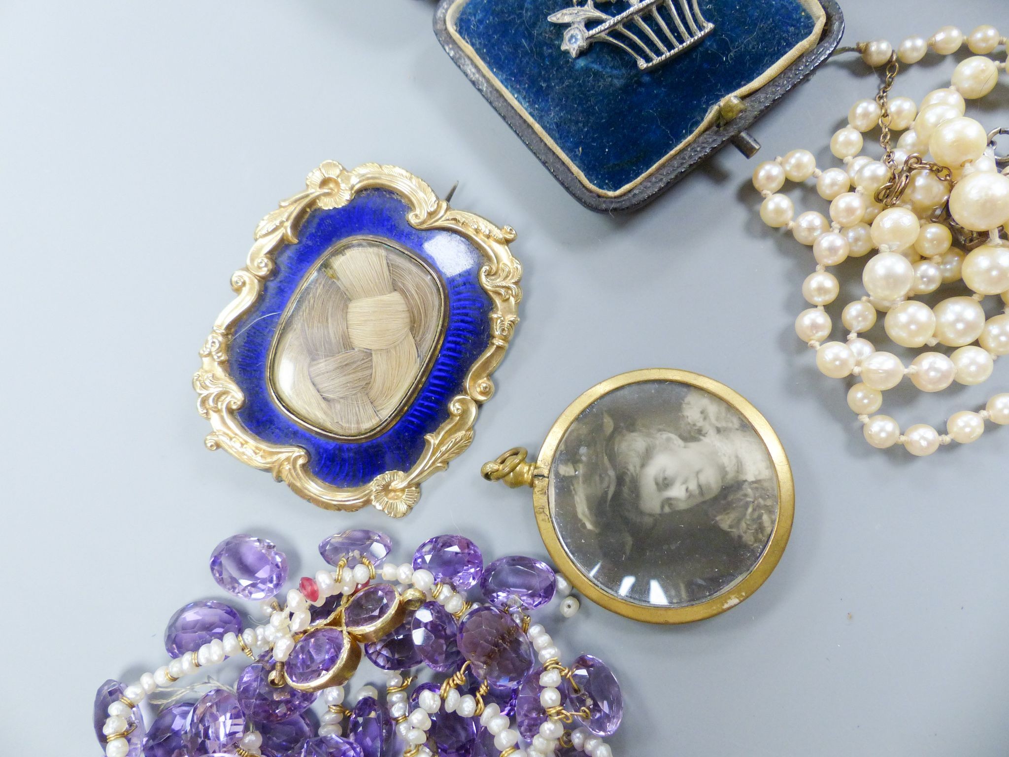 Mixed jewellery including a Victorian enamelled and plaited hair mourning brooch, a giardinetto brooch, cameo brooch, cultured pearl necklace, amethyst and seed pearl necklace and bracelet etc.